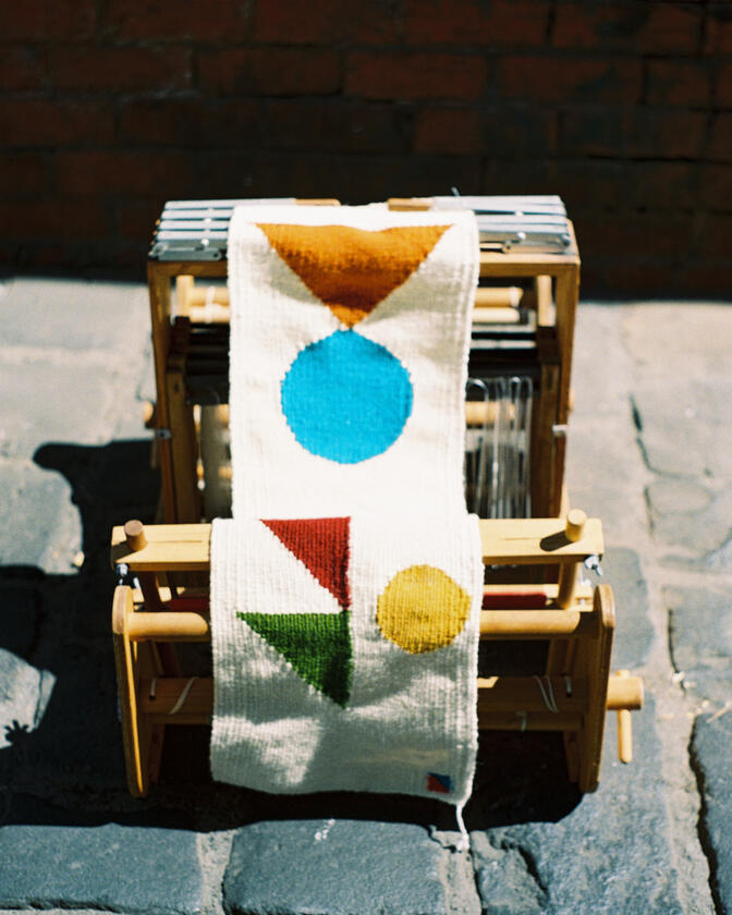 A woven textile art work by Liam Barwick