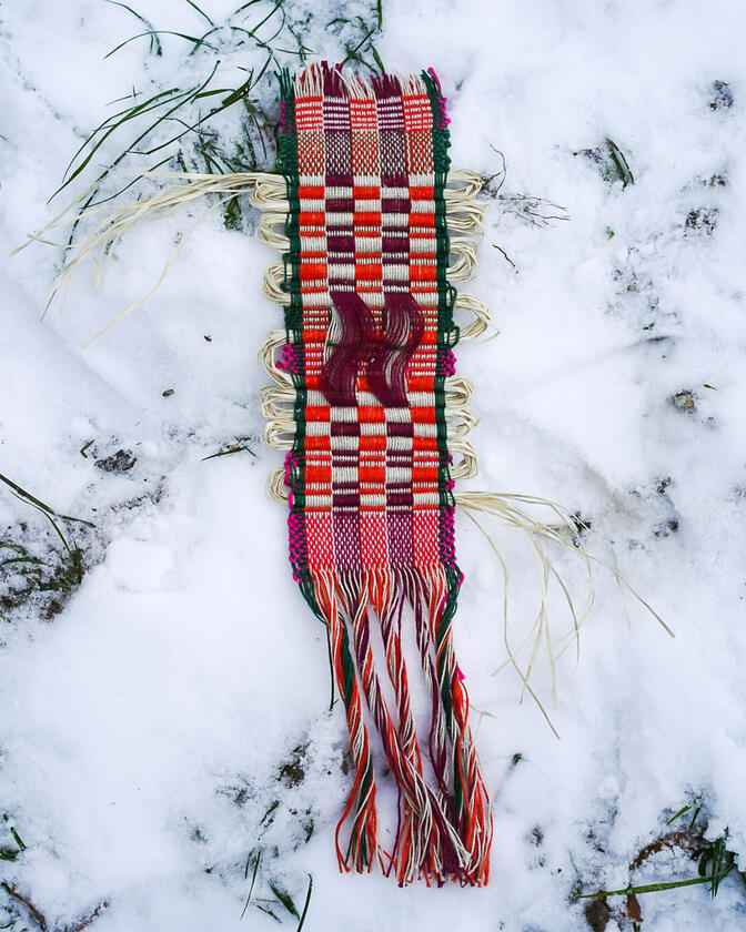A woven textile art work by Liam Barwick