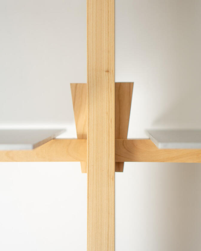 Wall shelf constructed of solid european cherry and hand brushed aluminium shelving designed and made by Liam Barwick