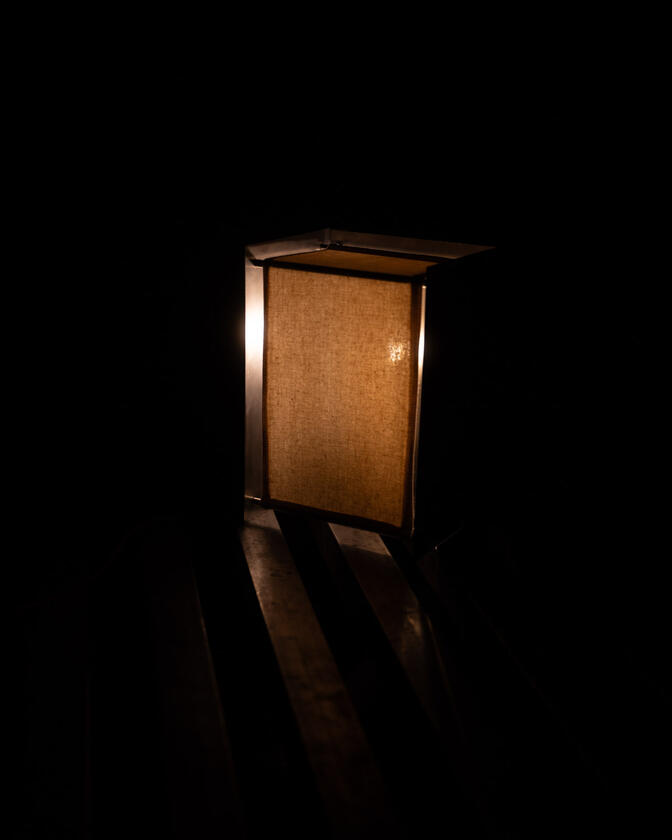 A table lamp constructed of a raw steel exterior and a soft organic cotton canvas diffuser. Designed and constructed by Liam Barwick