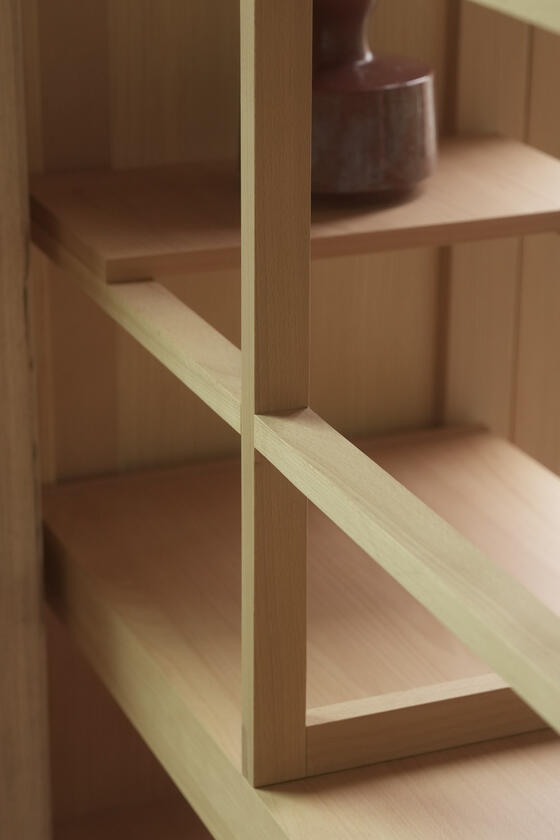 A shelving unit and room divider made of beech wood designer and built by Liam Barwick