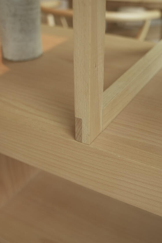 A shelving unit and room divider made of beech wood designer and built by Liam Barwick