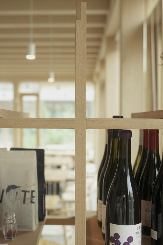 A shelving unit and room divider made of beech wood designer and built by Liam Barwick