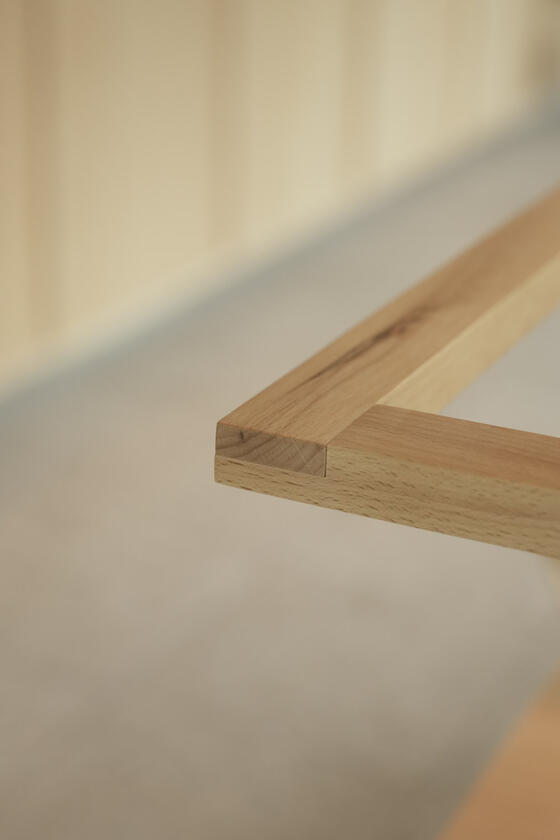 A shelving unit and room divider made of beech wood designer and built by Liam Barwick