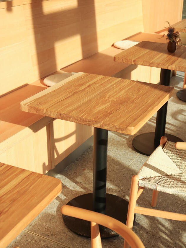A square solid ash table designed and made for a restaurant by Liam Barwick
