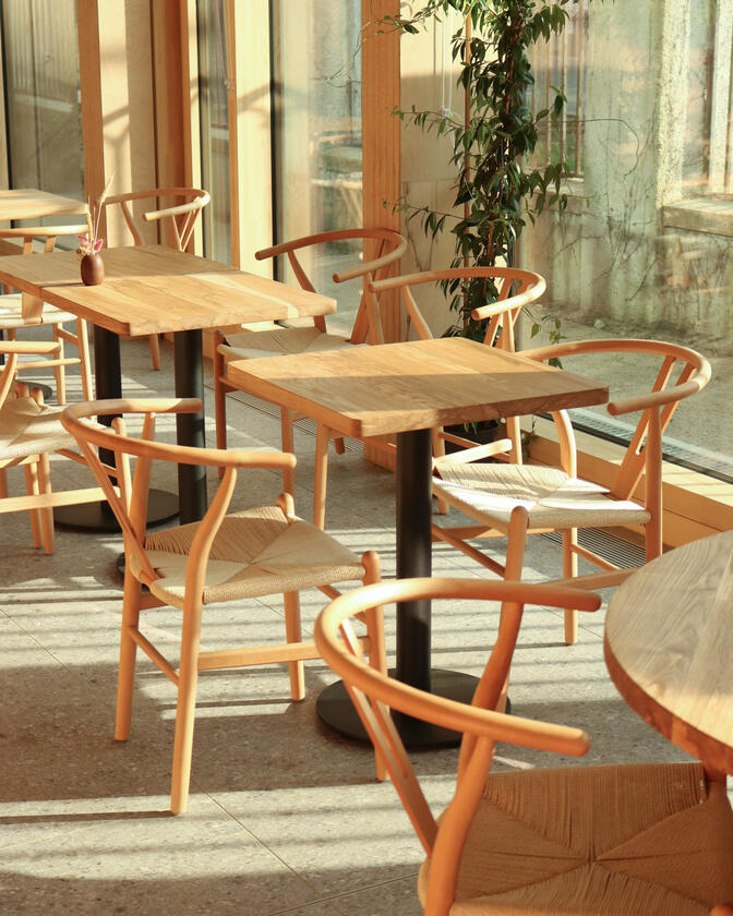 A square solid ash table designed and made for a restaurant by Liam Barwick