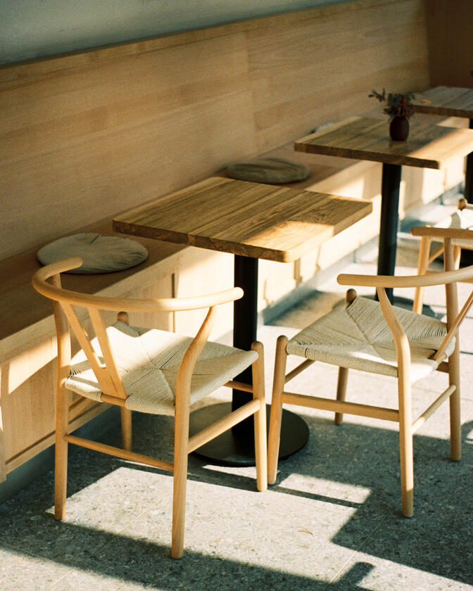 A square solid ash table designed and made for a restaurant by Liam Barwick