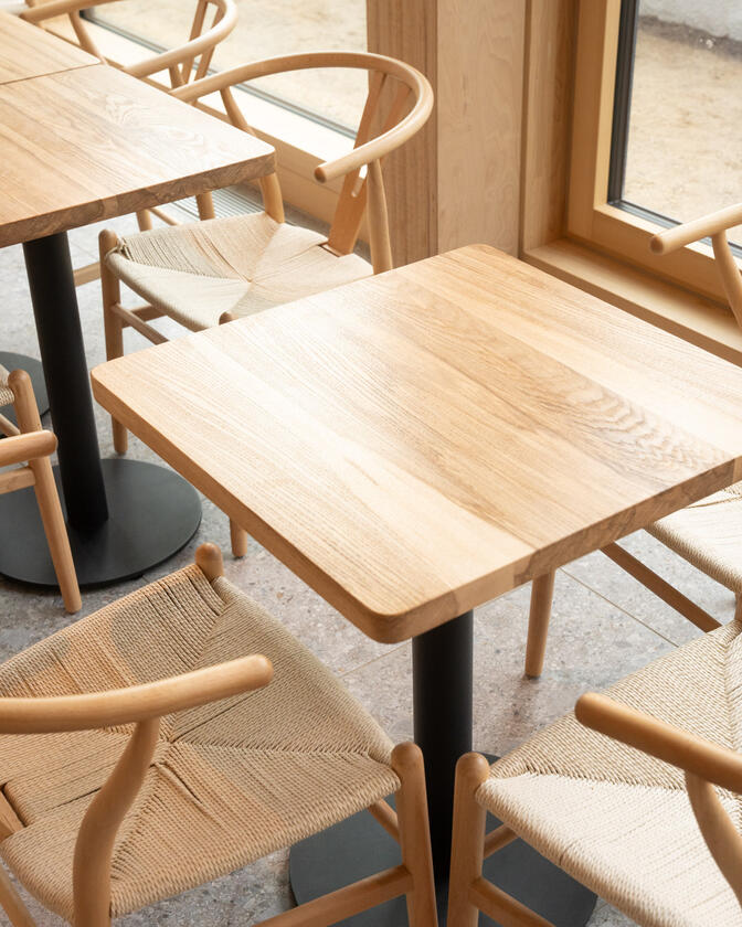 A square solid ash table designed and made for a restaurant by Liam Barwick