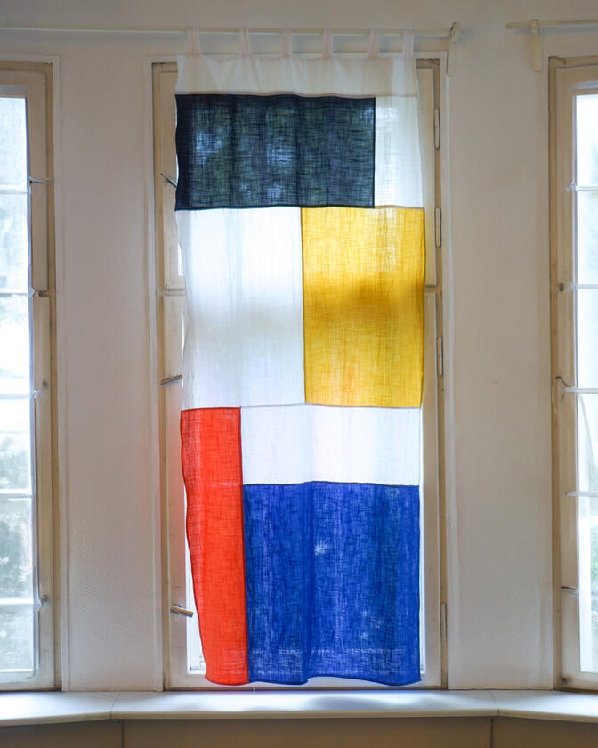 A set of colourful linen curtains in the traditional korean patchwork style of pojagi, designed and made by Liam Barwick