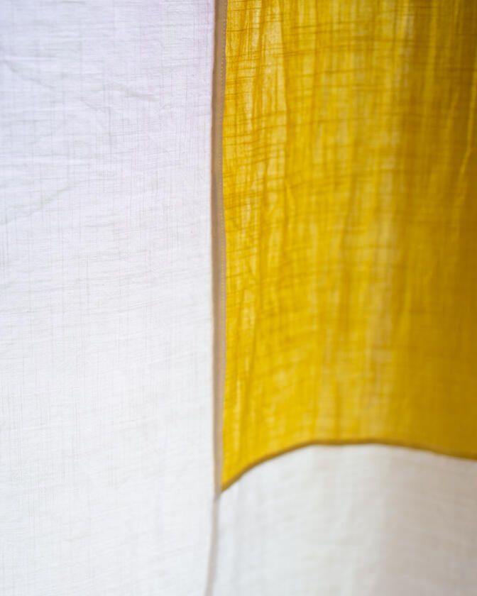 A set of colourful linen curtains in the traditional korean patchwork style of pojagi, designed and made by Liam Barwick