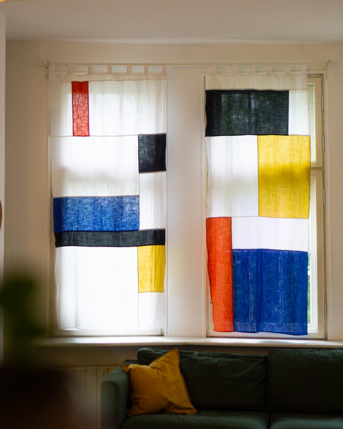 A set of colourful linen curtains in the traditional korean patchwork style of pojagi, designed and made by Liam Barwick
